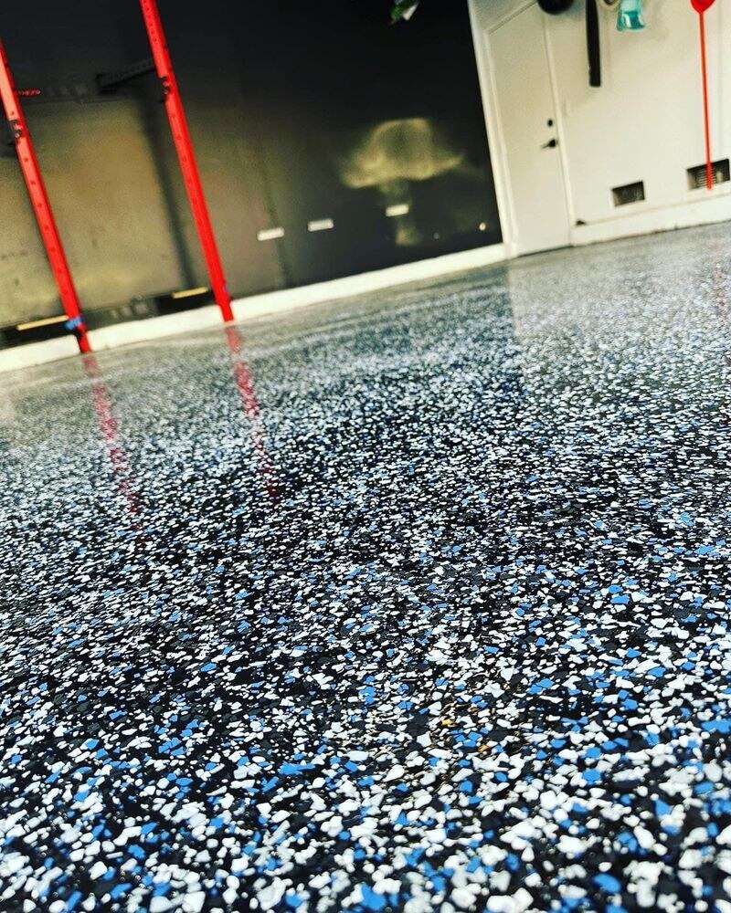 Epoxy flooring installation in progress in San Diego, CA by TurboSurfacing