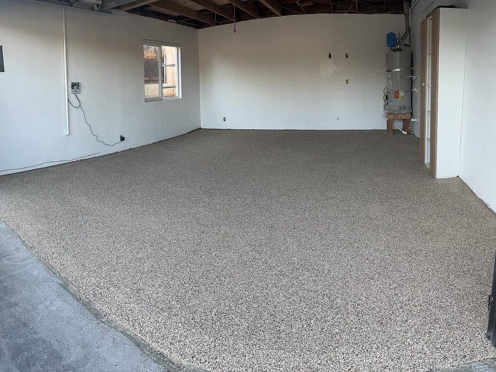 Epoxy garage floor coating installed in a San Diego home by Turbo Surfacing Solutions