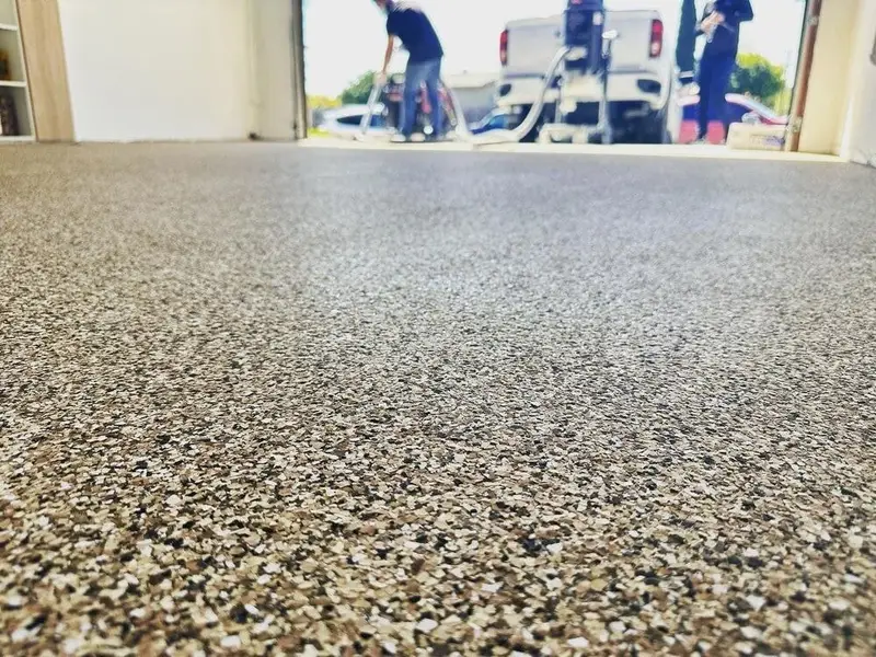 Epoxy-coated warehouse floor installed in San Diego by Turbo Surfacing Solutions