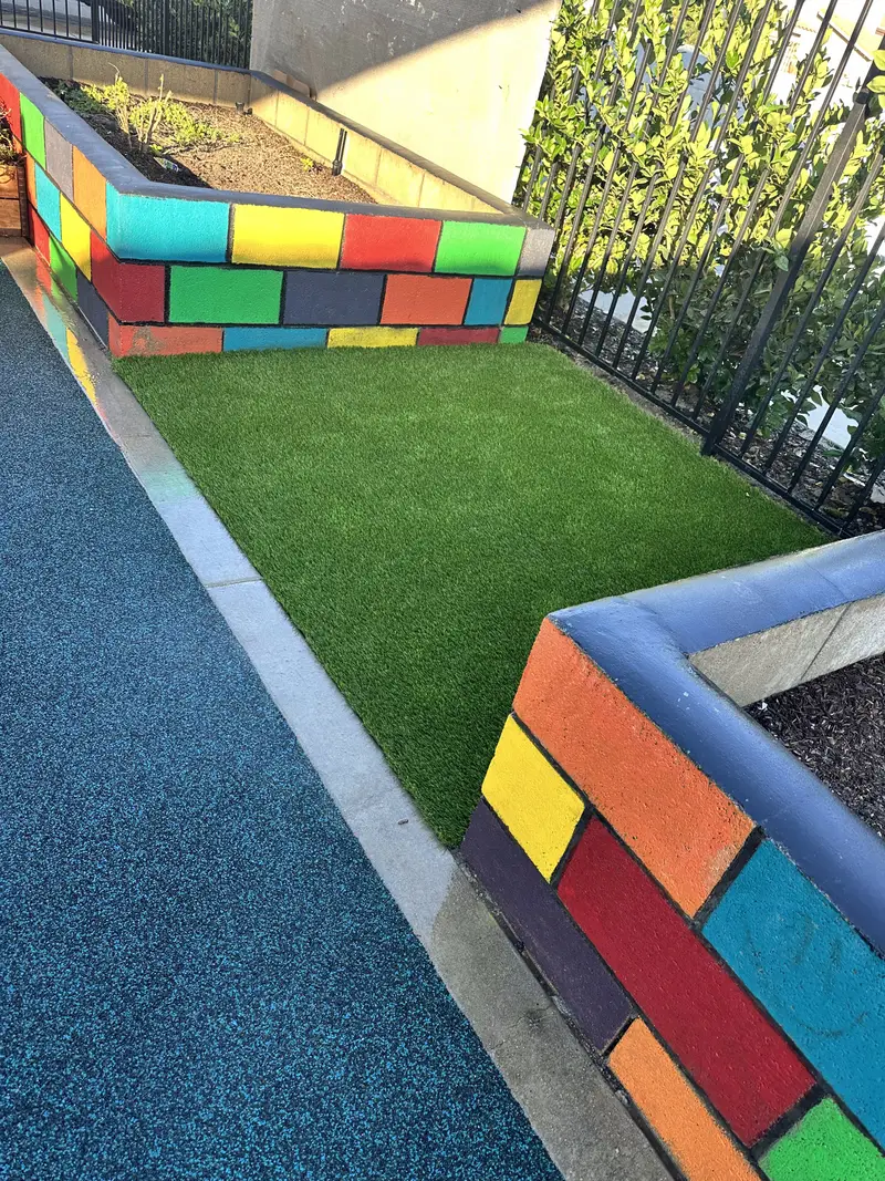 Rooftop rubber deck surfacing — Turbo Surfacing Solutions Decorative poured-in-place rubber patio deck installed in by Turbo Surfacing Solutions