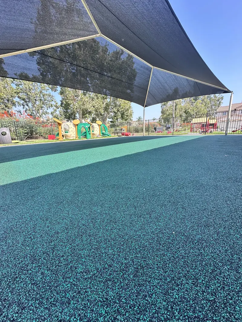 Water park rubber flooring — Turbo Surfacing Solutions Colorful poured-in-place rubber surfacing at a play area by Turbo Surfacing Solutions