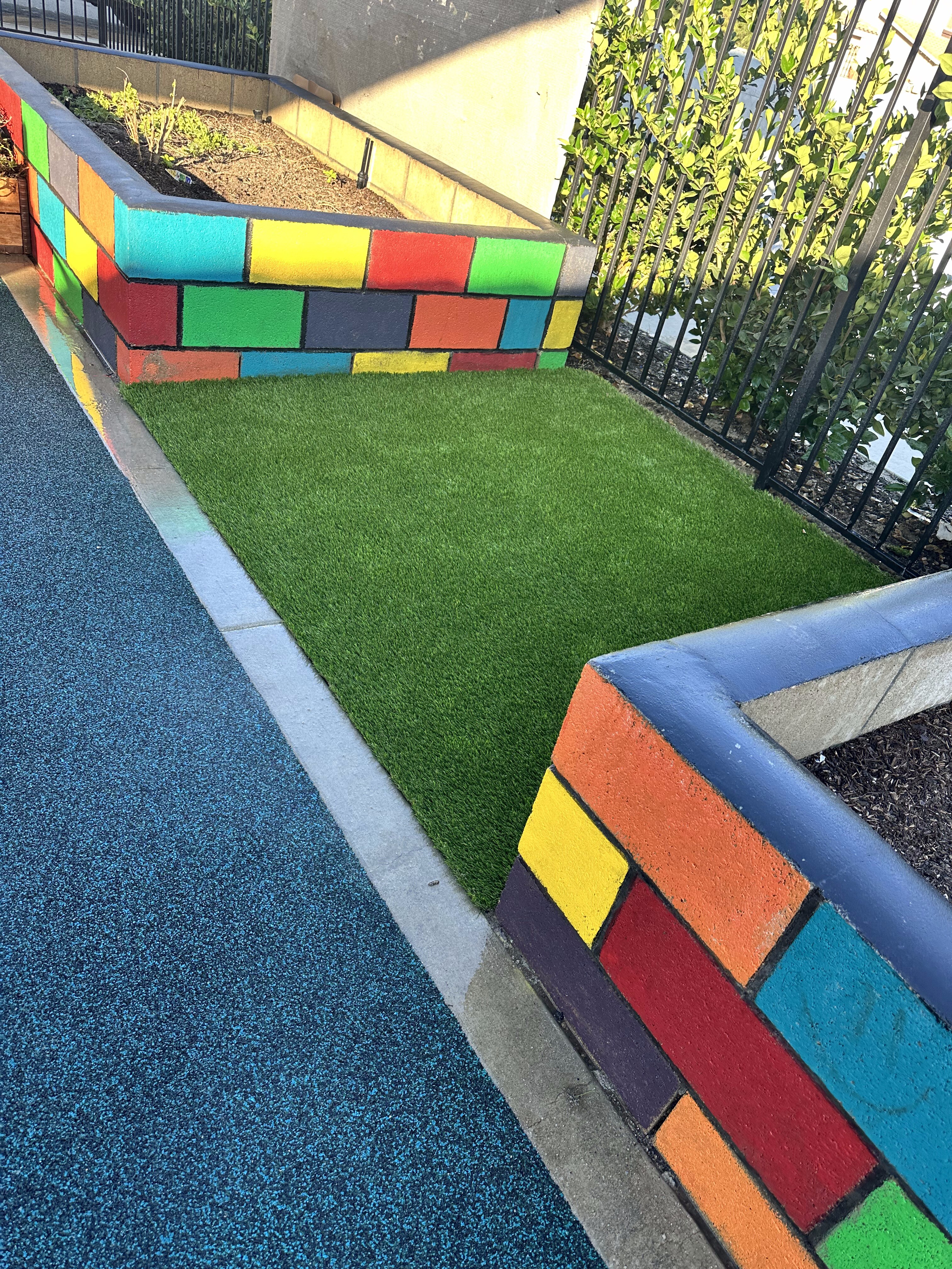 Decorative poured-in-place rubber patio in San Diego, CA by TurboSurfacing