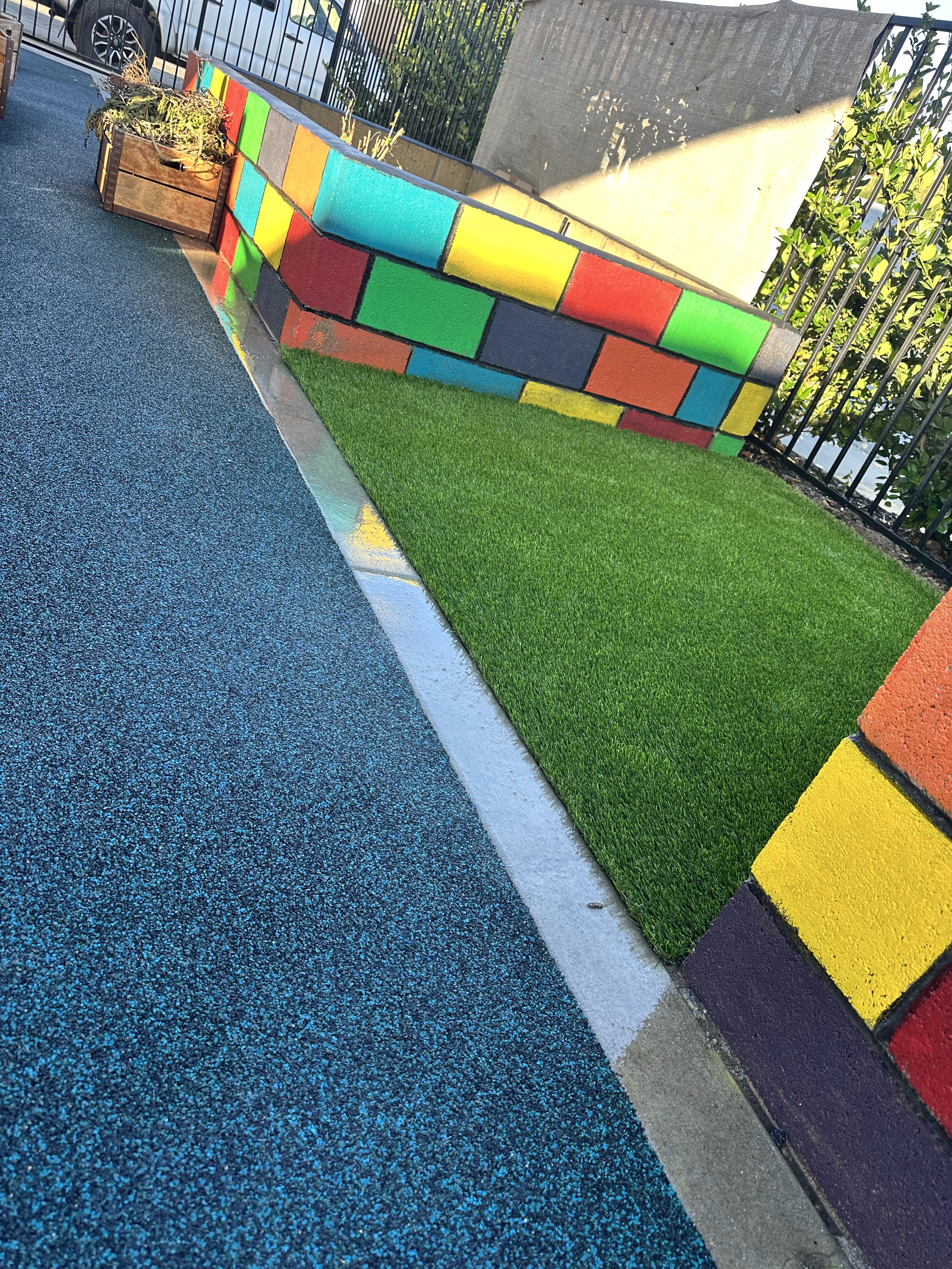 Decorative poured-in-place rubber patio in San Diego, CA by TurboSurfacing