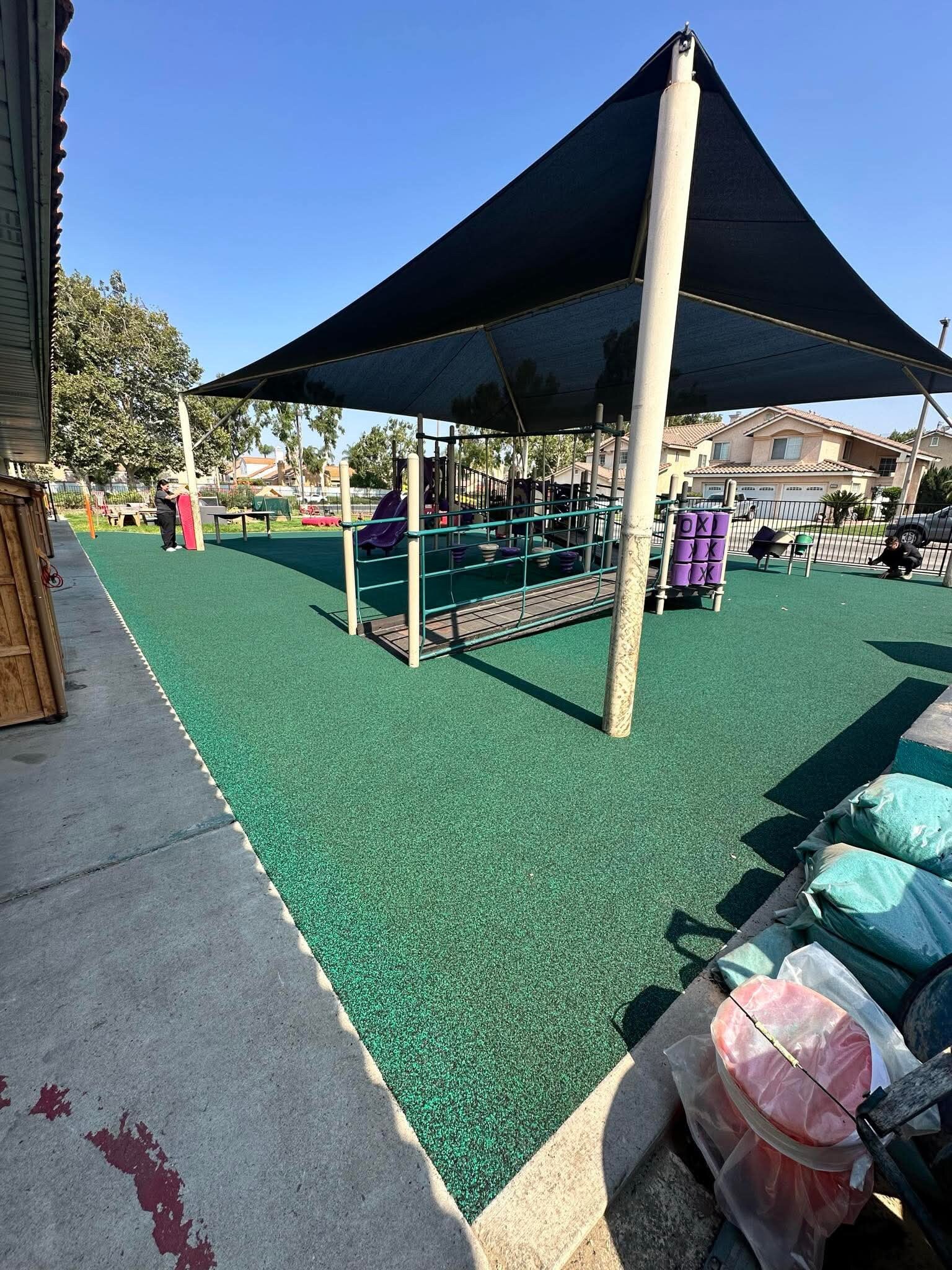 Colorful poured-in-place rubber playground safety surface installed in San Diego, CA by Turbo Surfacing Solutions