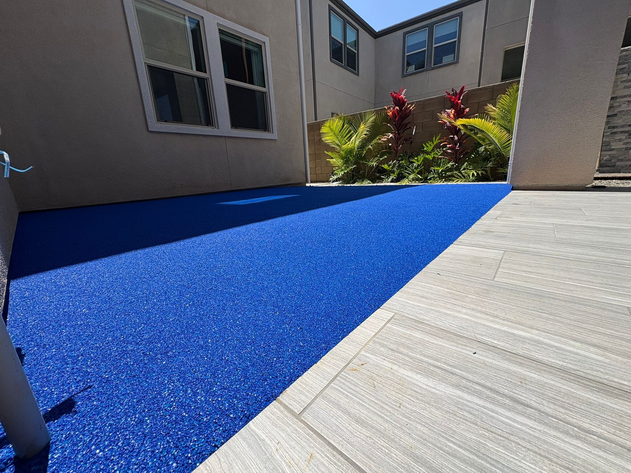 Poured-in-place rubber walkway installation in San Diego, CA by TurboSurfacing