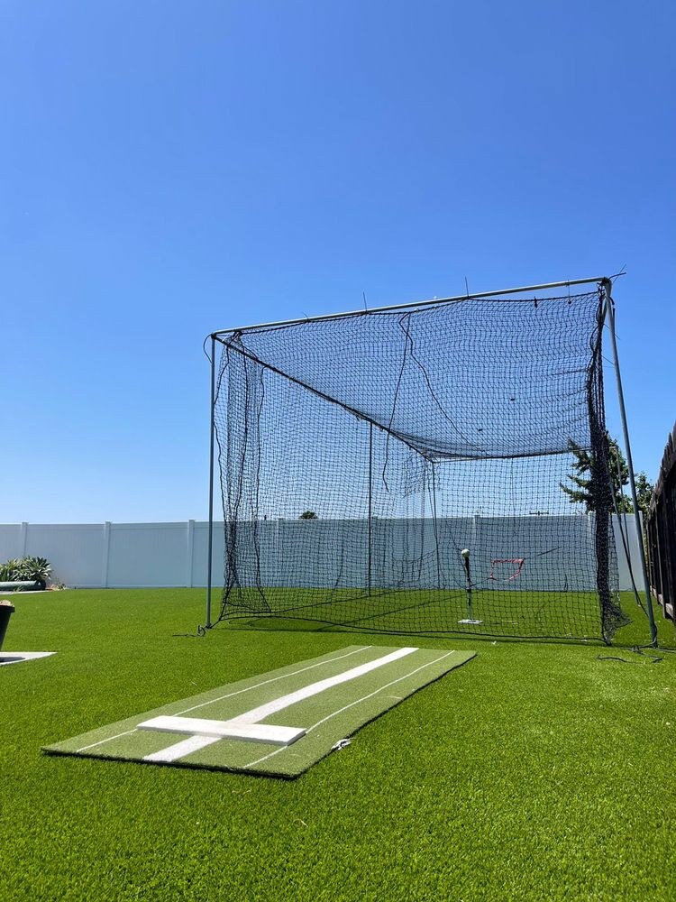 Artificial grass batting cage installation in San Diego, CA by TurboSurfacing