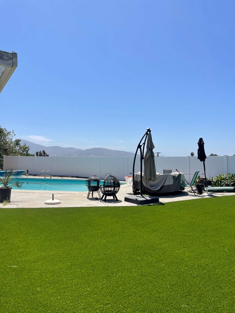 Artificial grass pool deck surround in San Diego, CA by TurboSurfacing