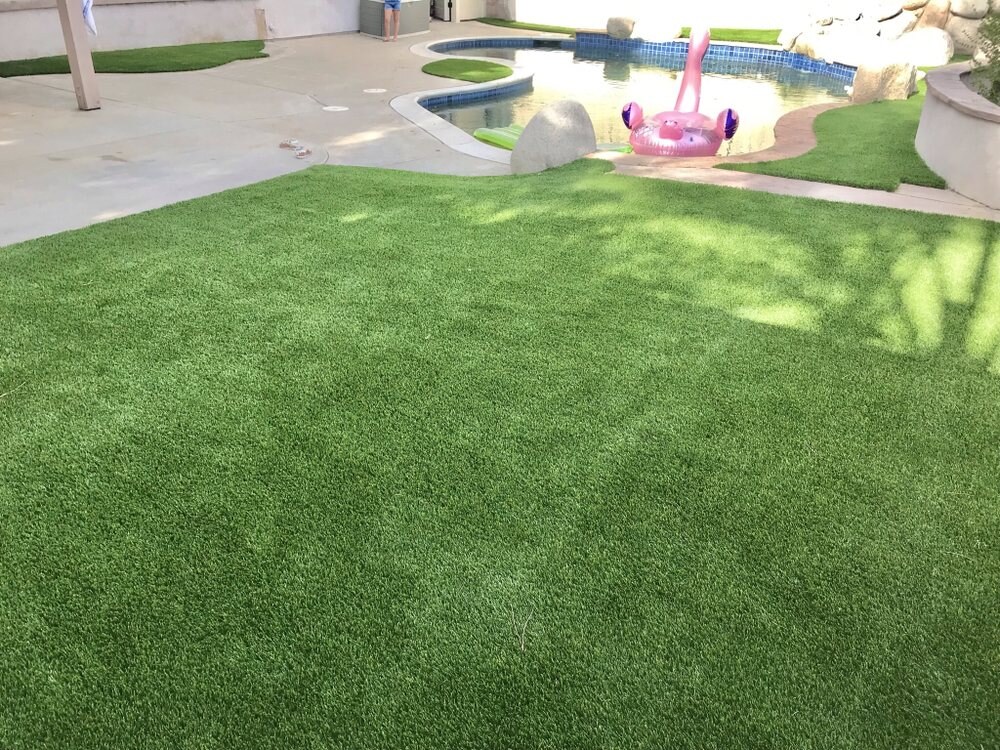 Artificial grass pool deck surround in San Diego, CA by TurboSurfacing