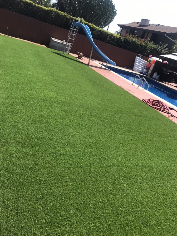 Artificial grass pool deck surround in San Diego, CA by TurboSurfacing