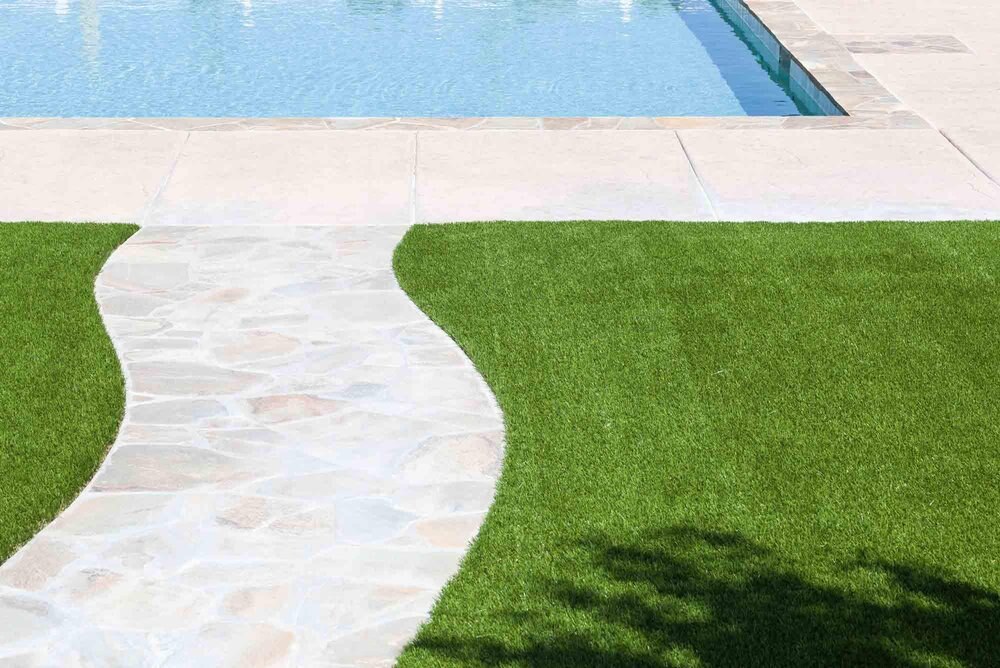 Artificial grass pool deck surround in San Diego, CA by TurboSurfacing