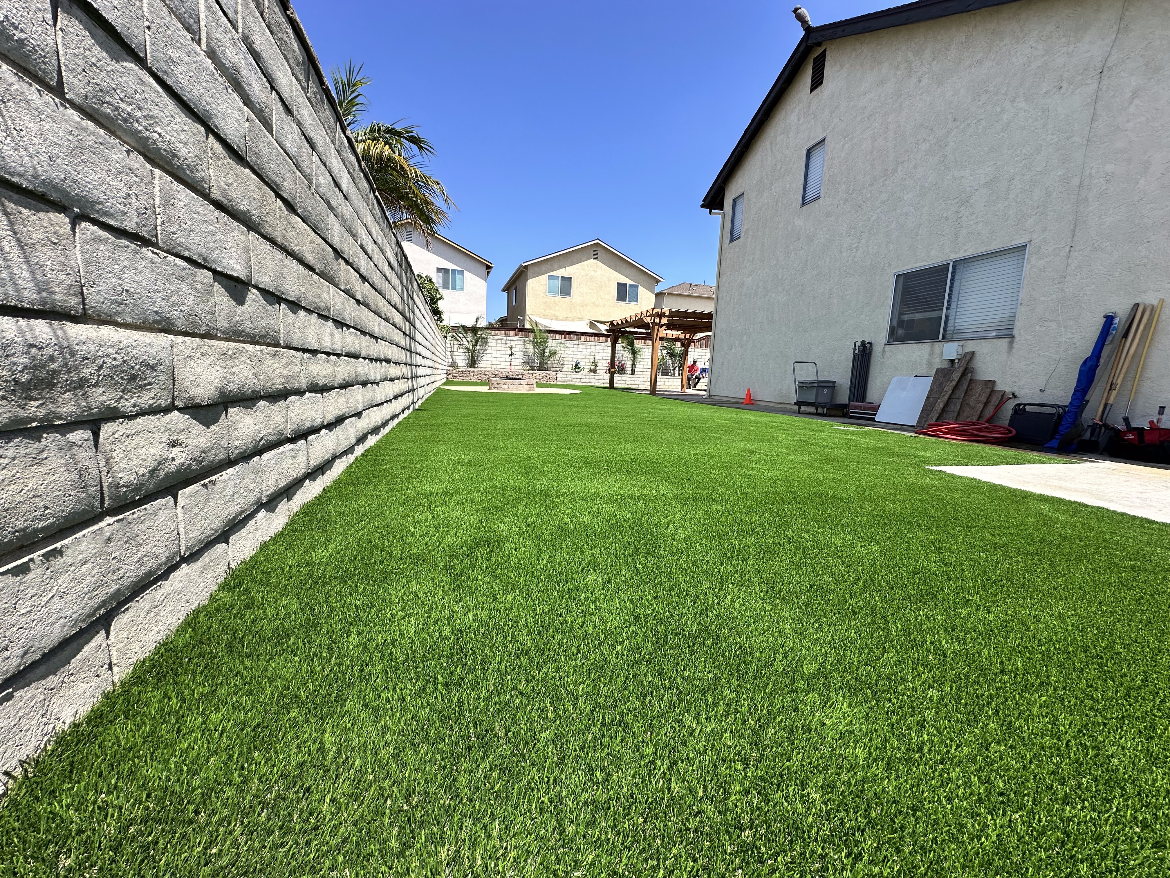 Artificial grass residential backyard in San Diego, CA by TurboSurfacing