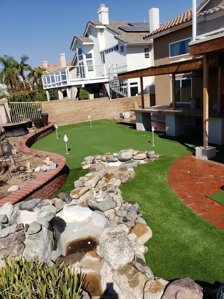 Artificial grass residential backyard in San Diego, CA by TurboSurfacing