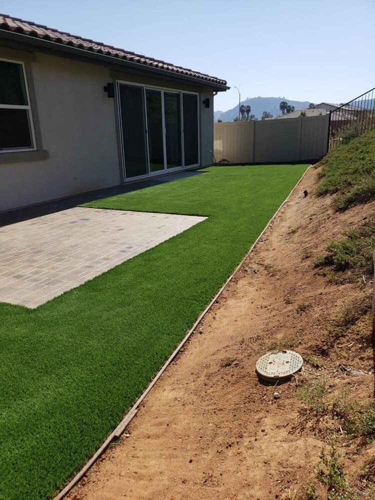Artificial grass residential backyard in San Diego, CA by TurboSurfacing