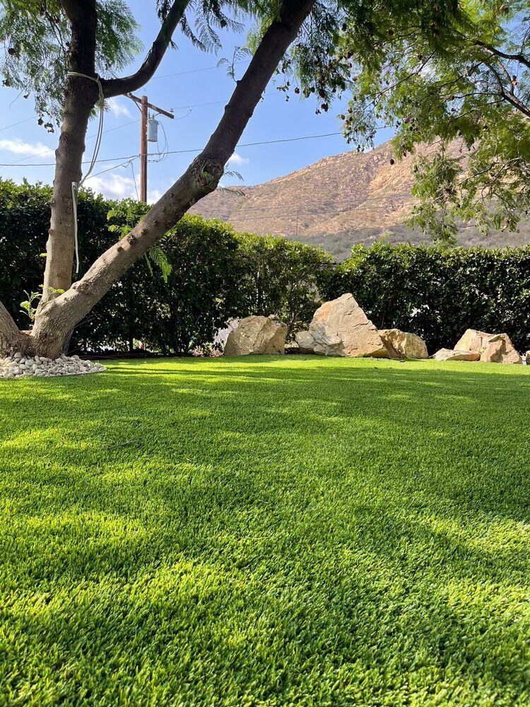 Artificial grass residential backyard in San Diego, CA by TurboSurfacing
