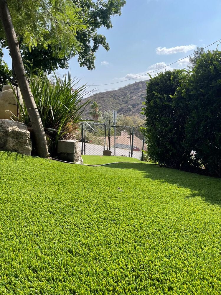 Artificial grass residential backyard in San Diego, CA by TurboSurfacing