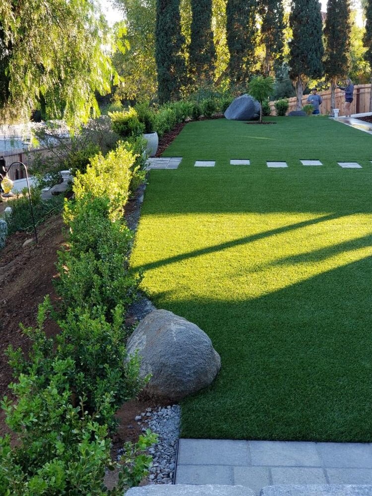 Artificial grass residential backyard in San Diego, CA by TurboSurfacing