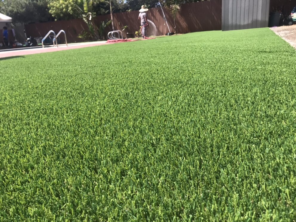 Artificial grass residential backyard in San Diego, CA by TurboSurfacing